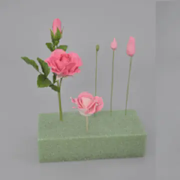 Styrofoam blocks are used by students at the International Sugar Art Collection